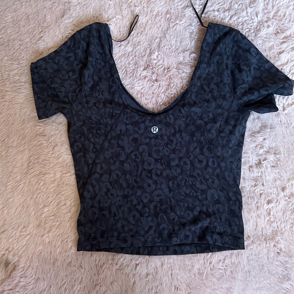Lululemon shirt. Cropped. Never worn. Super cute - Picture 2 of 2